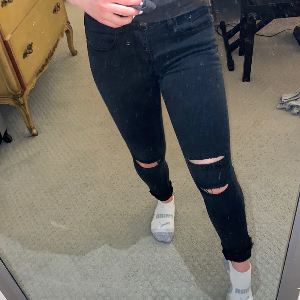 black ripped jeans